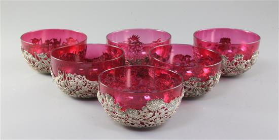 A set of six late 19th/early 20th century Chinese Export silver finger bowls by Wang Hing & Co, Hong Kong, with ruby glass liners,